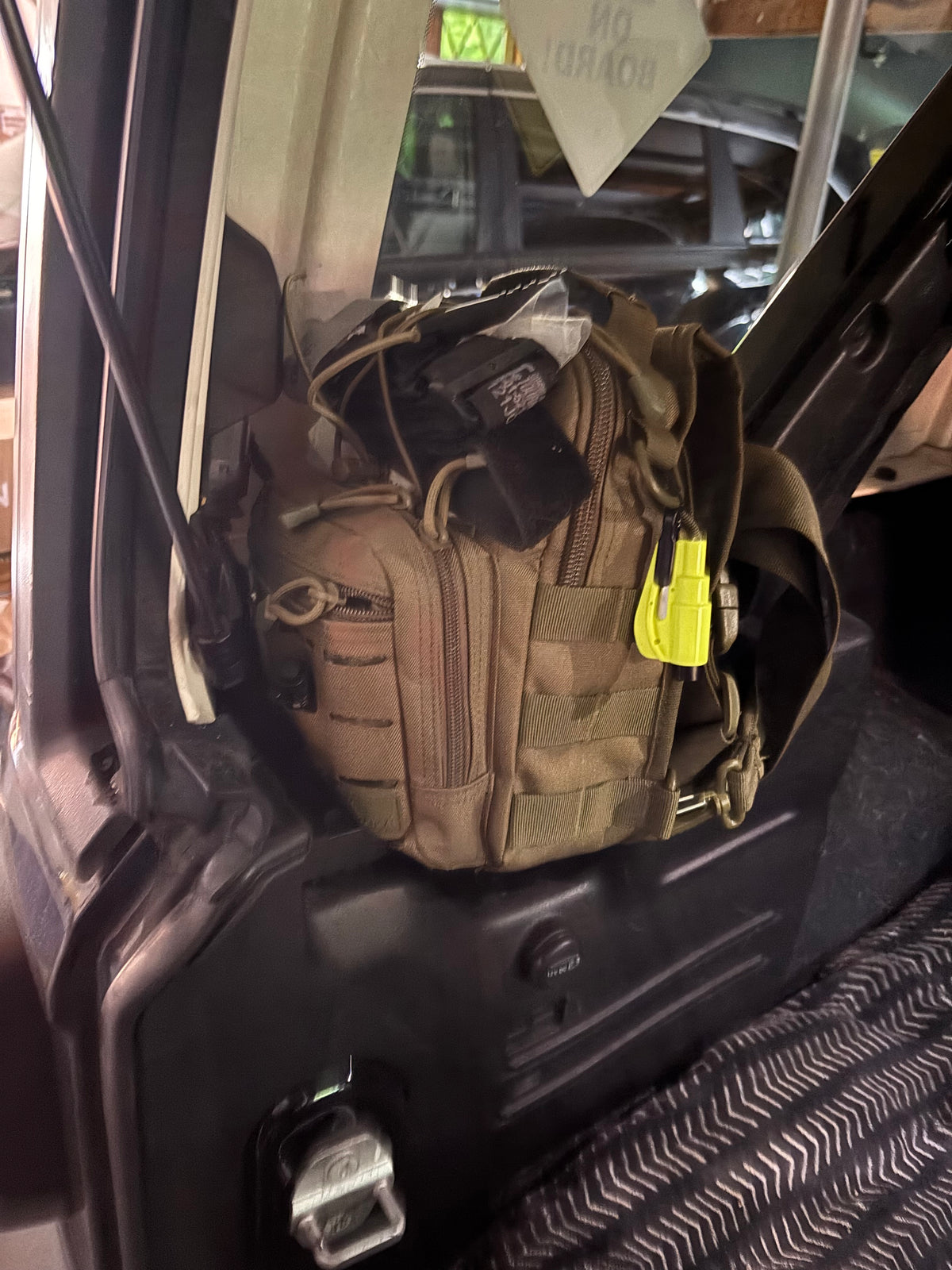 A trauma and first aid kit compact enough to fit behind a jeep’s roll bar.